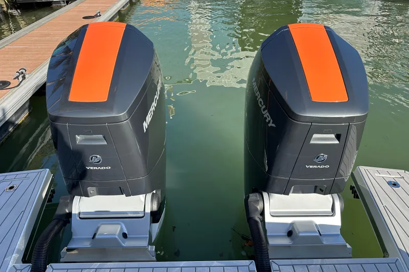 Slide: The Image of Twin Mercury Verado engines on a 2024 Formula 387 Center Console Fish boat. - 9