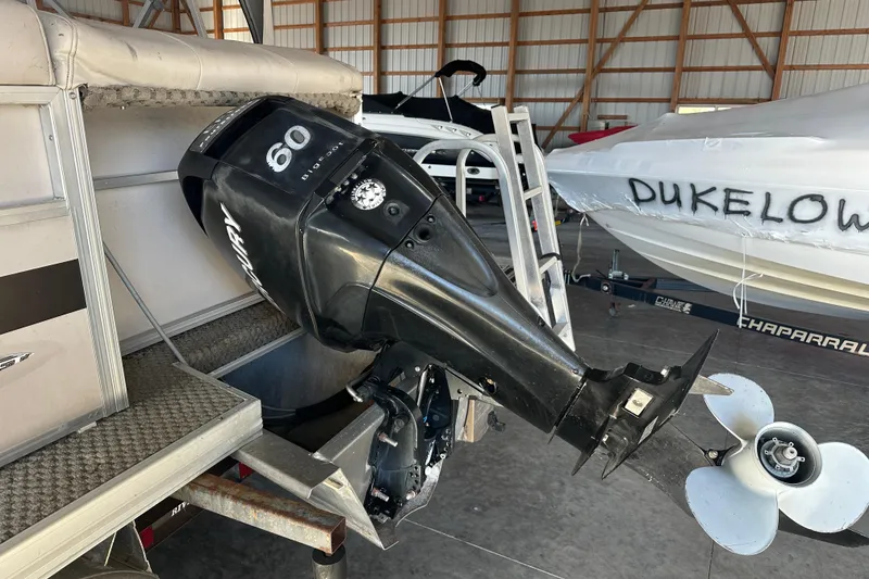 Slide: The Image of 2008 Princecraft Vectra 200 L with Mercury 60 outboard motor in storage. - 3