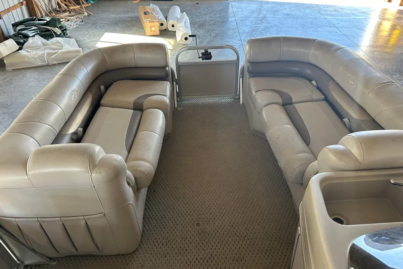 Slide: The Image of 2008 Princecraft Vectra 200 L pontoon boat interior with beige seating and carpet. - 6