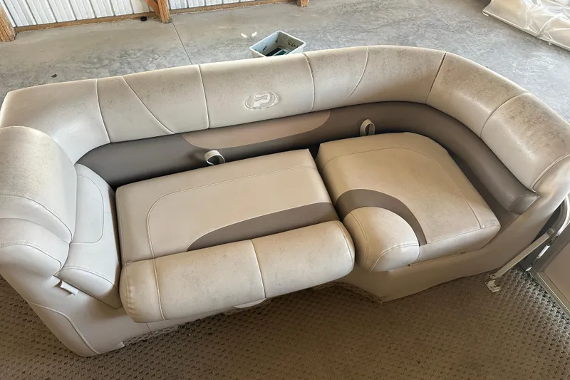 Slide: The Image of 2008 Princecraft Vectra 200 L boat seating, beige upholstery, indoor setting. - 8