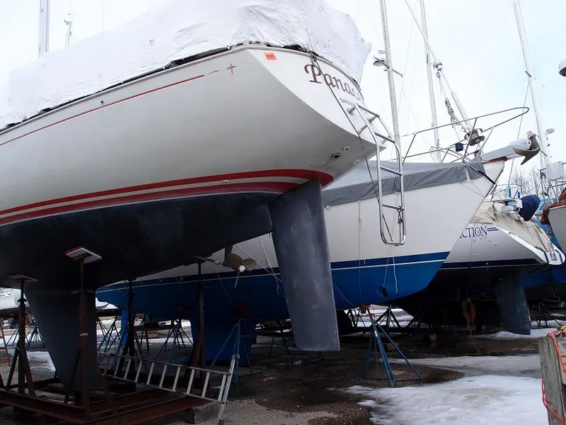 Slide: The Image of 1985 C&C 37 sailboat on a dry dock. - 13