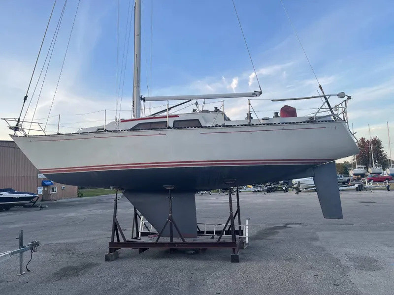 Slide: The Image of 1985 C&C 37 sailboat on a dry dock. - 19