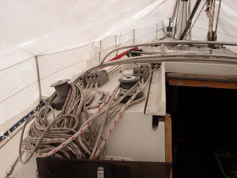 Slide: The Image of Deck of a 1985 C&C 37 sailboat with ropes and winches. - 39