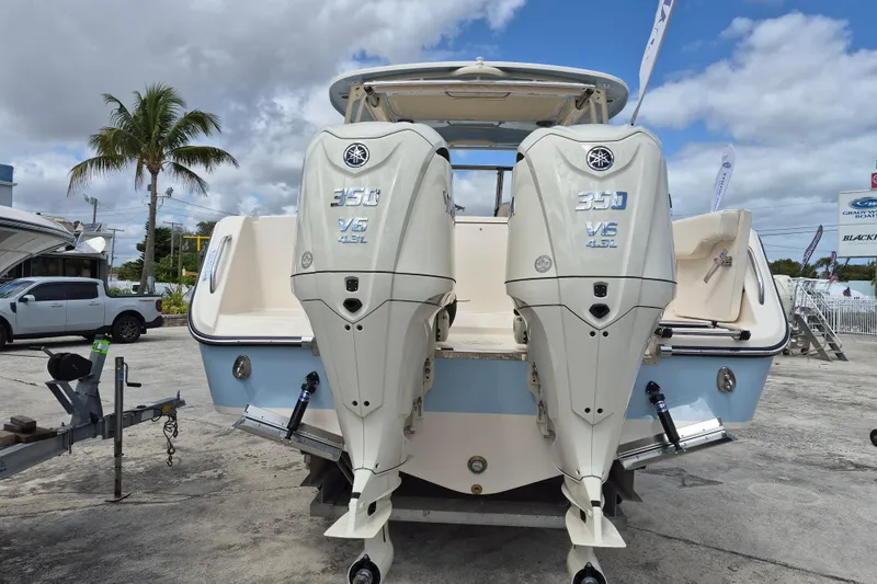 Slide: The Image of 2026 Grady-White Freedom 307 boat with twin Yamaha 350 V6 engines. - 25