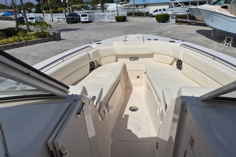 Slide: The Image of 2026 Grady-White Freedom 307 boat interior with spacious seating and modern design. - 3