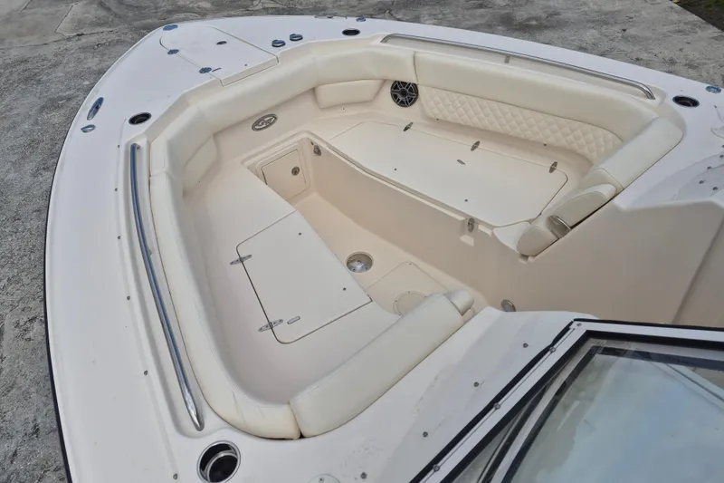 Slide: The Image of 2026 Grady-White Freedom 307 boat interior with spacious seating and storage compartments. - 7