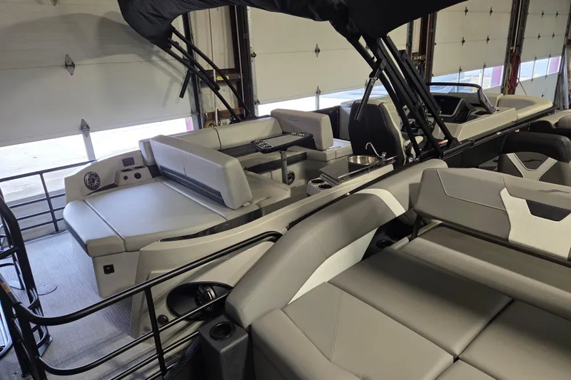 Slide: The Image of 2025 Sylvan G3 CLZ boat interior with luxurious seating and modern design. - 15
