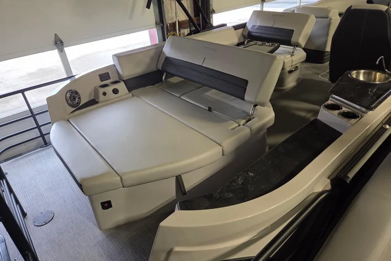 Slide: The Image of 2025 Sylvan G3 CLZ boat interior with luxurious seating and modern amenities. - 24