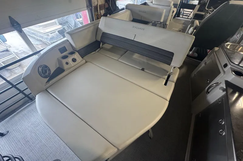 Slide: The Image of 2025 Sylvan G3 CLZ boat interior with plush seating and modern amenities. - 29