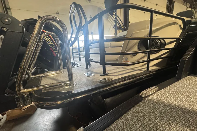 Slide: The Image of 2025 Sylvan G3 CLZ boat interior with sleek metal railings and modern design. - 36