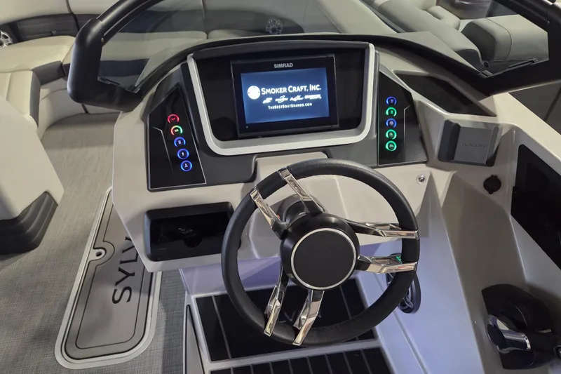 Slide: The Image of 2025 Sylvan G3 CLZ boat dashboard with modern steering wheel and digital display. - 5