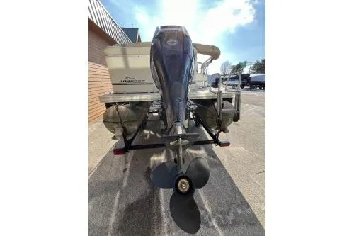 Slide: The Image of 2011 Sun Tracker Party Barge 20 DLX pontoon boat with outboard motor, rear view. - 5