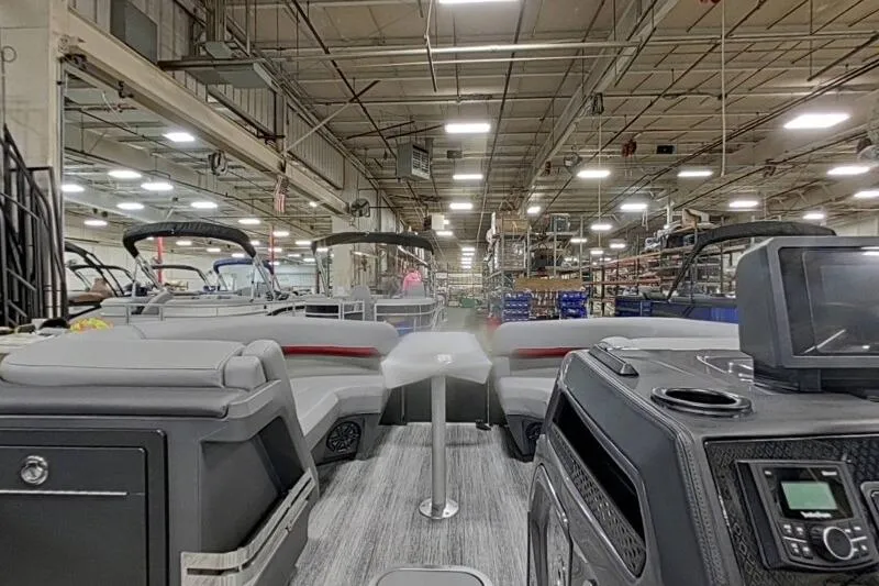 Slide: The Image of 2026 Bennington 23 MFBSF pontoon boat interior in a manufacturing facility. - 17