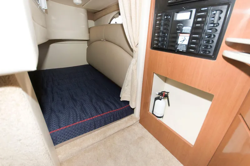 Slide: The Image of Interior of a 2006 Maxum 2600 SE boat with sleeping area. - 12