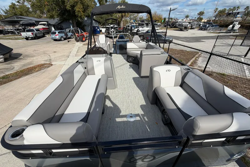 Slide: The Image of 2024 Avalon Venture Fish N Cruise 23' pontoon boat with spacious seating and modern design. - 3