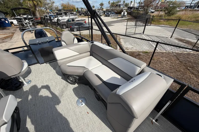 Slide: The Image of 2024 Avalon Venture Fish N Cruise 23' boat interior with plush seating and modern design. - 4