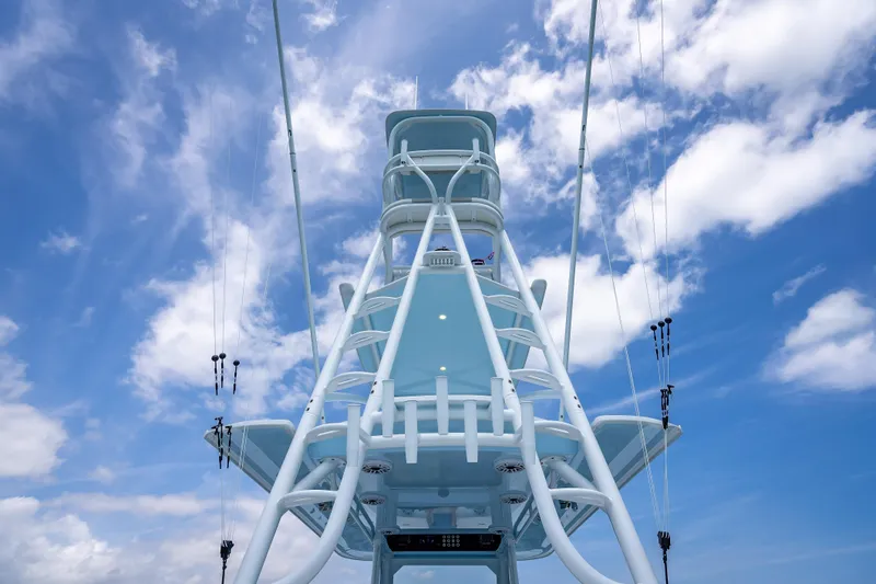 Slide: The Image of Freeman 43 boat tower against a blue sky, 2025 model. - 113