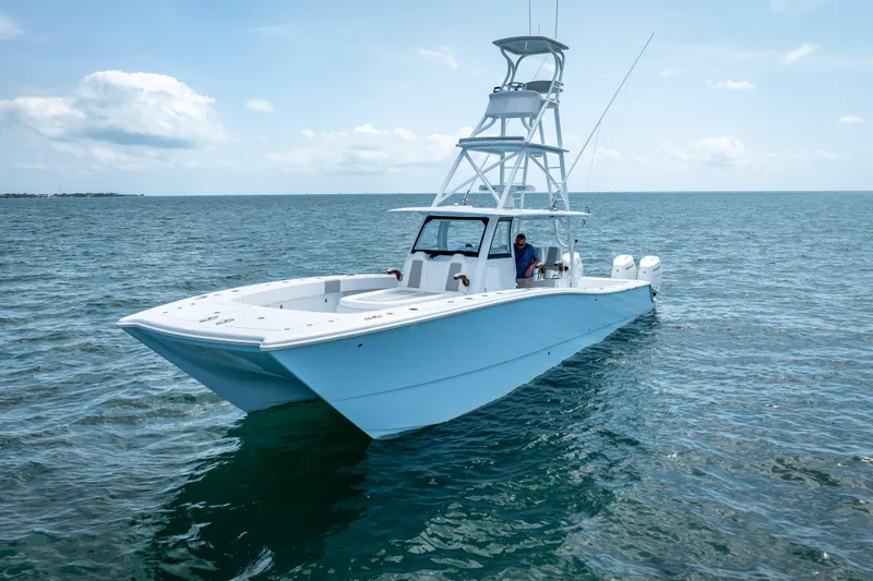 Slide: The Image of 2025 Freeman 43 boat on open sea under clear sky. - 12