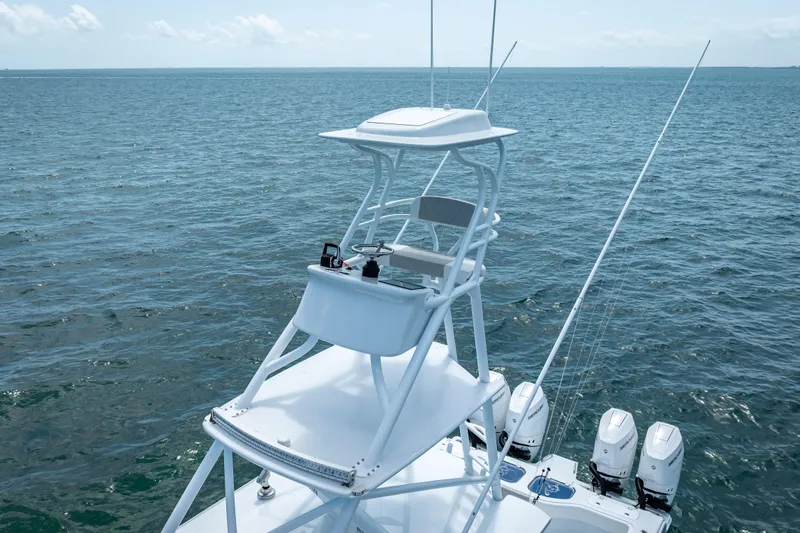 Slide: The Image of Freeman 43 boat, 2025 model, with elevated helm station on open sea. - 29