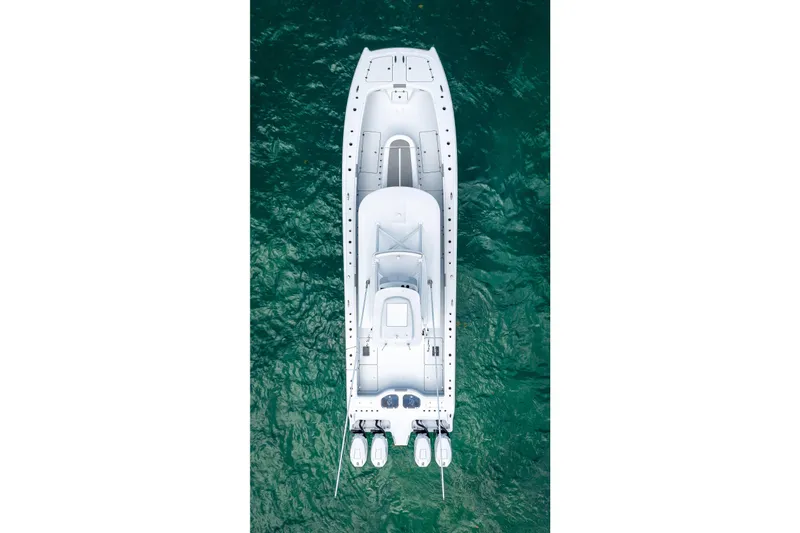 Slide: The Image of Aerial view of 2025 Freeman 43 boat on turquoise water. - 31