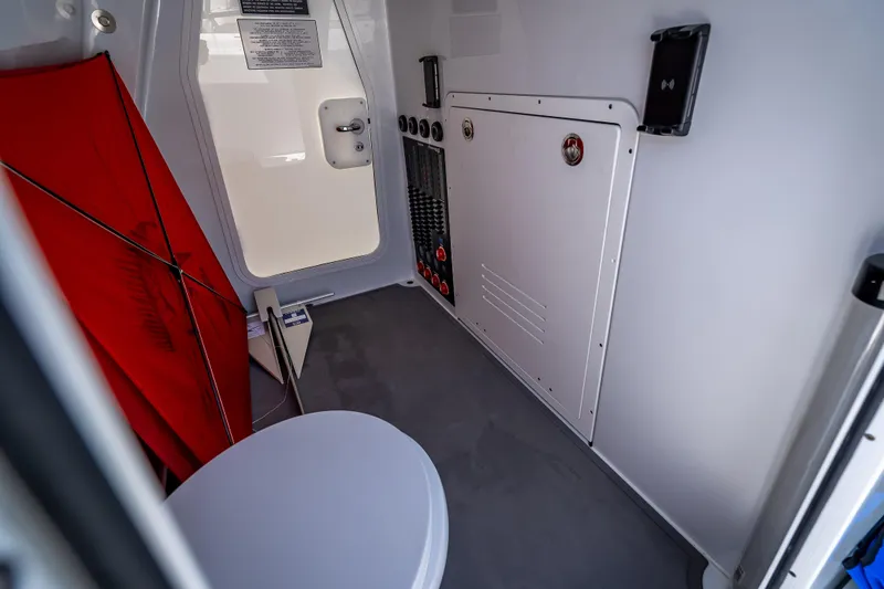 Slide: The Image of Interior of 2025 Freeman 43 boat, featuring modern design and equipment storage. - 54