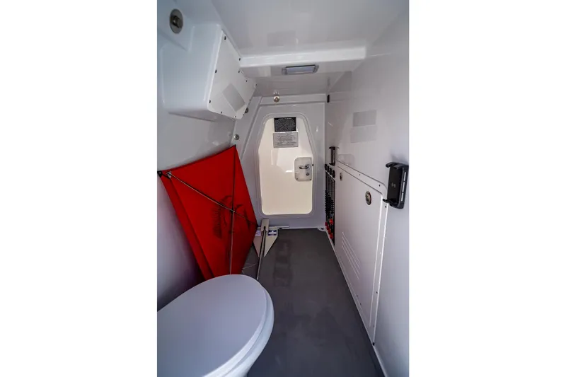 Slide: The Image of Interior of 2025 Freeman 43 boat, featuring compact bathroom with modern amenities. - 55