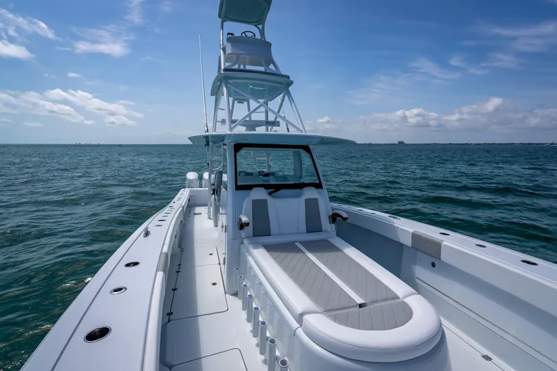 Slide: The Image of 2025 Freeman 43 boat on open sea under clear blue sky. - 66