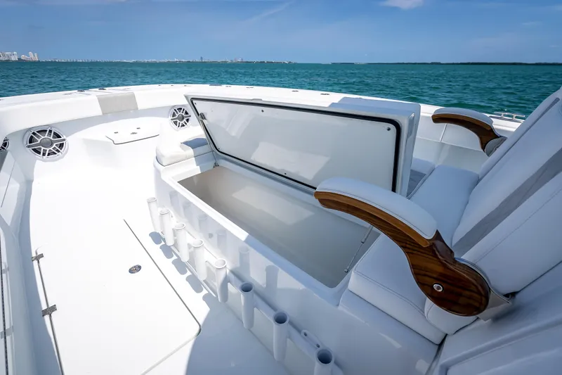 Slide: The Image of Luxurious 2025 Freeman 43 boat interior with open storage and elegant seating. - 77