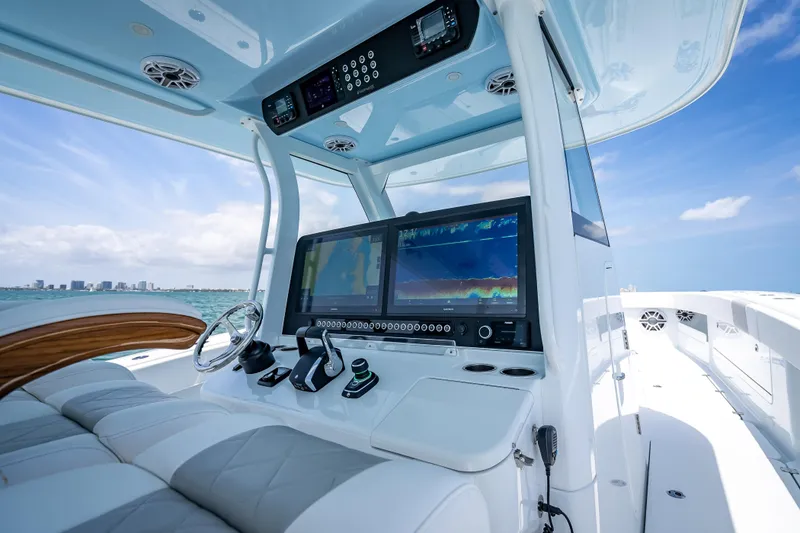Slide: The Image of Modern helm of 2025 Freeman 43 boat with advanced navigation systems. - 80