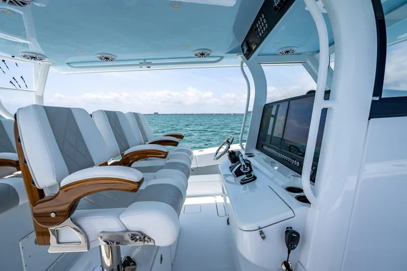 Slide: The Image of Luxurious interior of 2025 Freeman 43 boat with modern seating and navigation controls. - 82