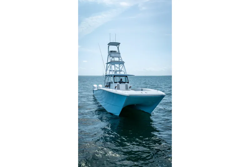 Slide: The Image of 2025 Freeman 43 boat on open sea under clear sky. - 9