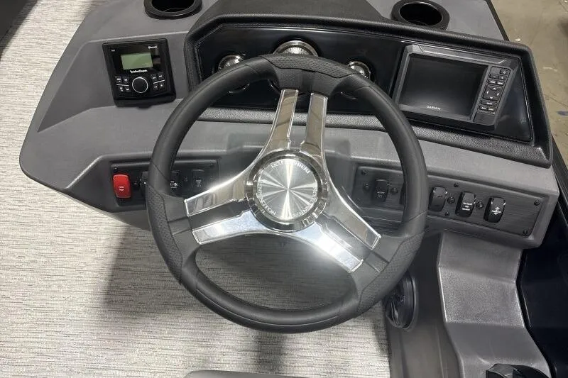 Slide: The Image of Steering console of 2026 Bennington 23 SSBSF boat with modern controls and display. - 14