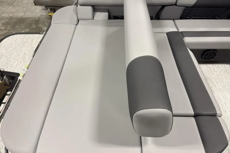 Slide: The Image of 2026 Bennington 23 SSBSF boat interior seating, featuring sleek gray upholstery. - 17