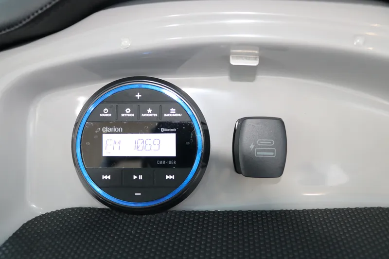 Slide: The Image of 2026 Chaparral 19 SSi OB boat stereo system with FM radio display. - 22