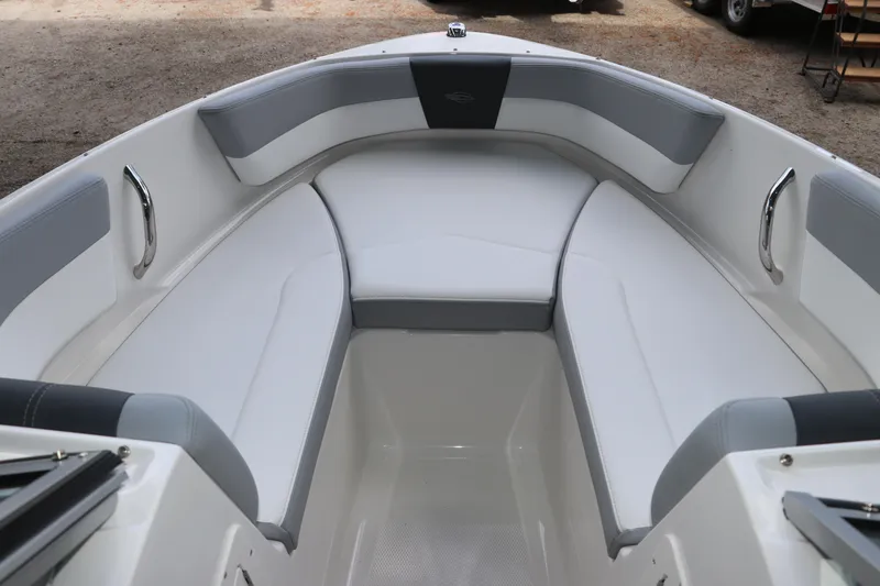 Slide: The Image of Interior view of 2026 Chaparral 19 SSi OB boat with cushioned seating. - 32