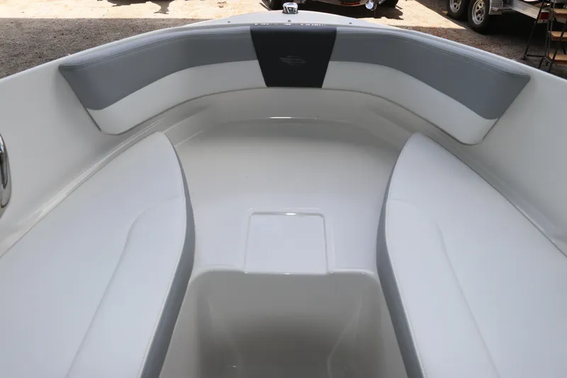 Slide: The Image of 2026 Chaparral 19 SSi OB boat interior with cushioned seating and sleek design. - 34