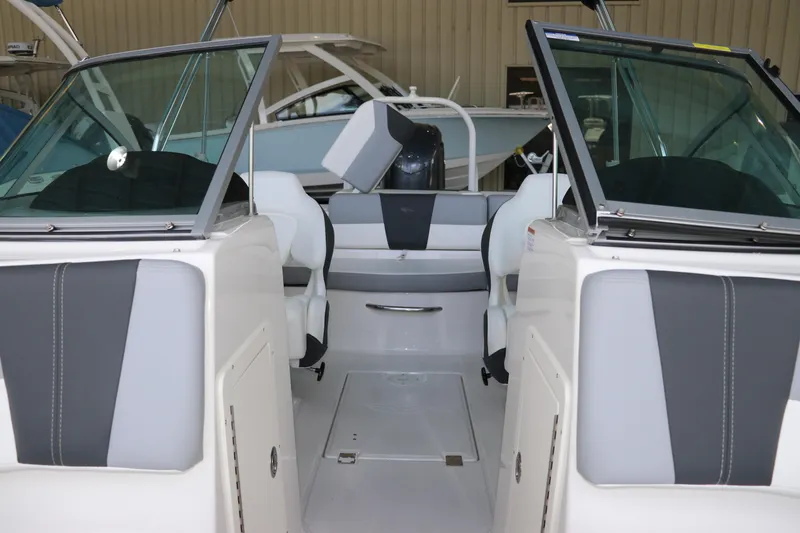 Slide: The Image of 2026 Chaparral 19 SSi OB boat interior with sleek seating and modern design. - 35