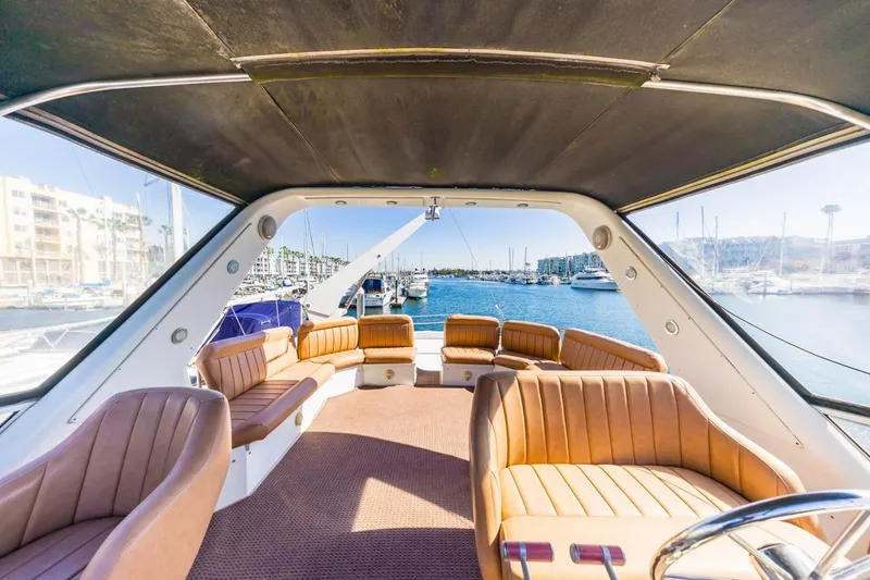 Slide: The Image of Interior view of 1996 Navigator 5300 Classic yacht with tan leather seating. - 25