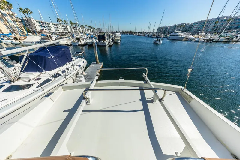 Slide: The Image of View from 1996 Navigator 5300 Classic yacht overlooking marina with boats and clear blue sky. - 28