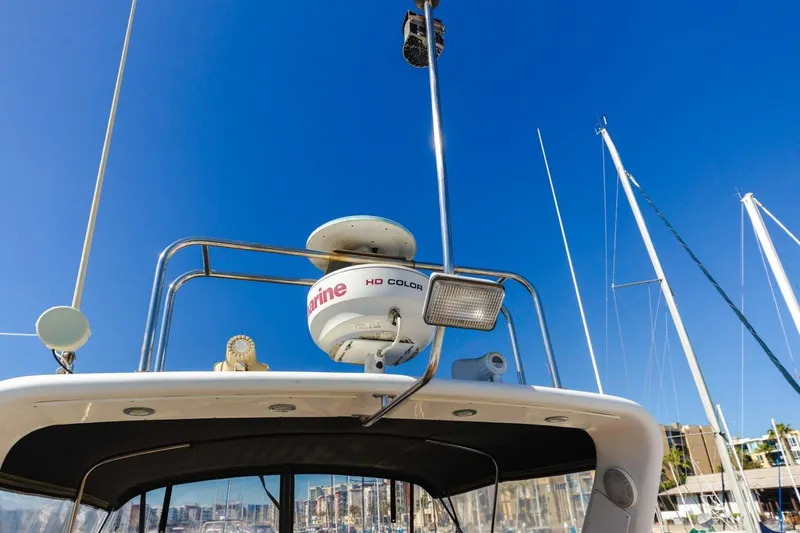 Slide: The Image of Radar equipment on a 1996 Navigator 5300 Classic yacht under clear blue sky. - 31