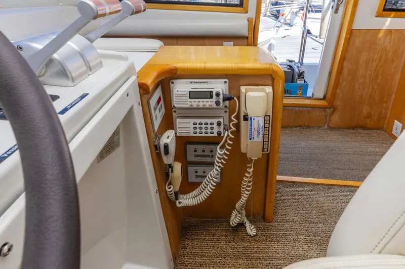 Slide: The Image of Interior of 1996 Navigator 5300 Classic yacht with communication equipment and controls. - 46