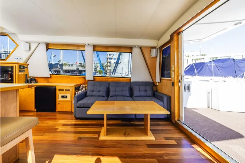 Slide: The Image of Interior of 1996 Navigator 5300 Classic yacht with wooden flooring and modern furnishings. - 52