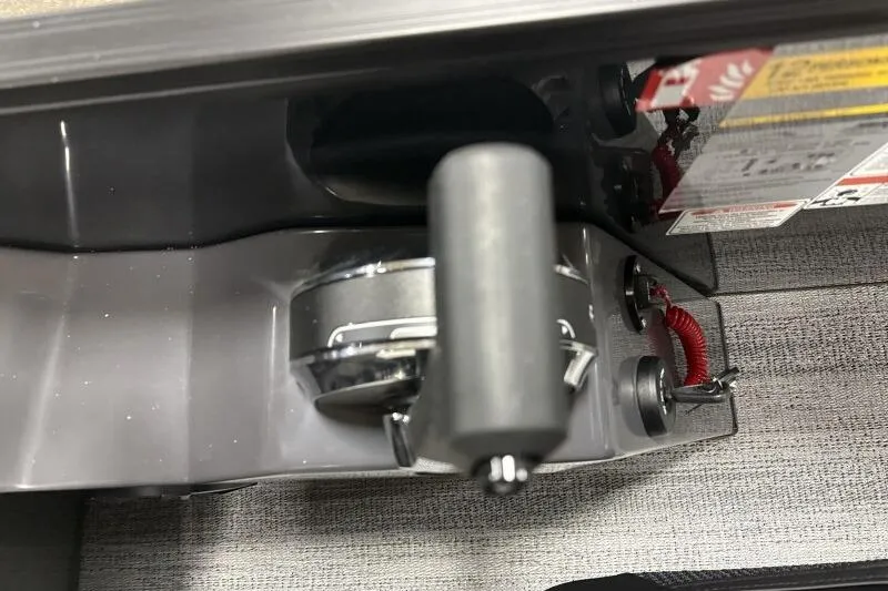 Slide: The Image of Control panel of 2026 Bennington 23 SSBSF boat with throttle and safety features. - 19