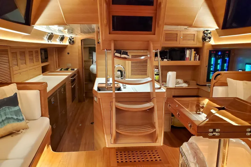 Slide: The Image of 2023 Bluewater 56 yacht deck with ocean view and clear blue sky. - 18