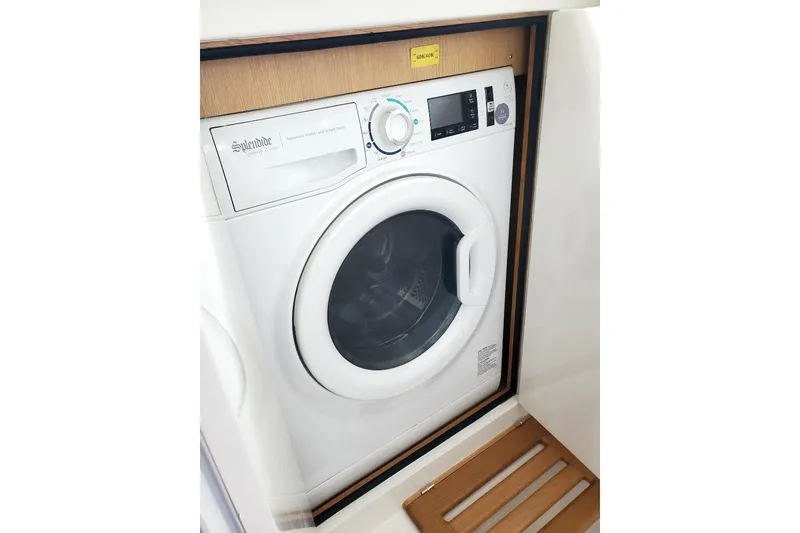 Slide: The Image of Electrical panel and navigation equipment inside a 2023 Bluewater 56 yacht. - 33