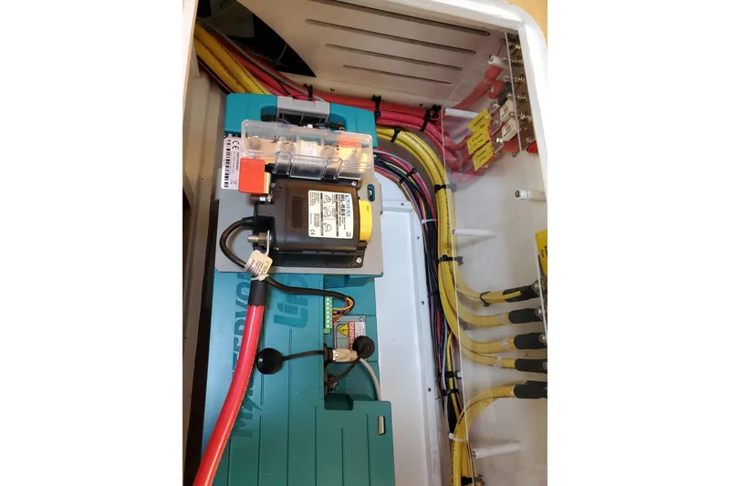 Slide: The Image of Luxurious cabin interior of 2023 Bluewater 56 yacht with cozy bed and wooden finish. - 39