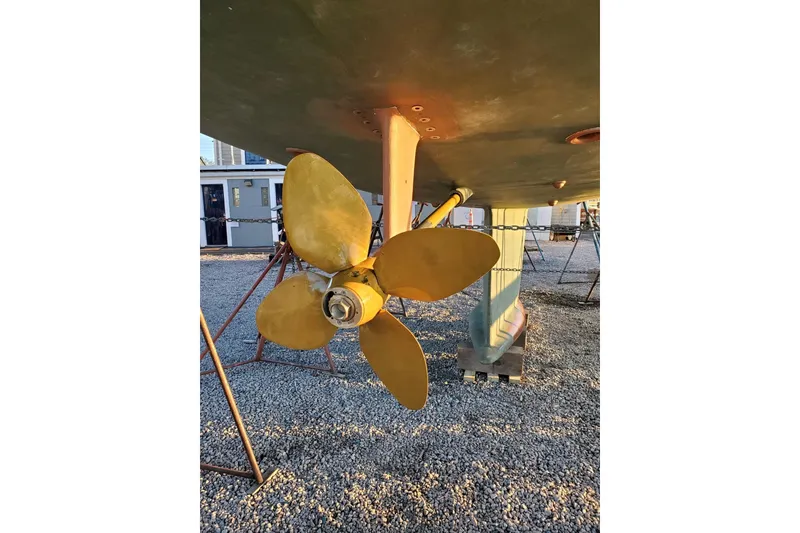 Slide: The Image of Luxurious 2023 Bluewater 56 yacht interior with cozy bedroom and modern amenities. - 41