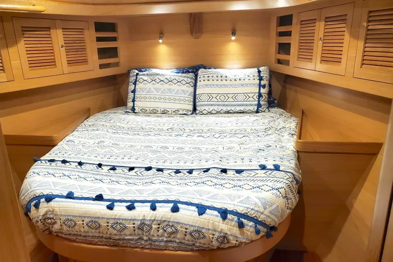 Slide: The Image of Luxury yacht bathroom with turtle-themed mosaic floor, featuring a modern toilet and wooden cabinetry. - 47