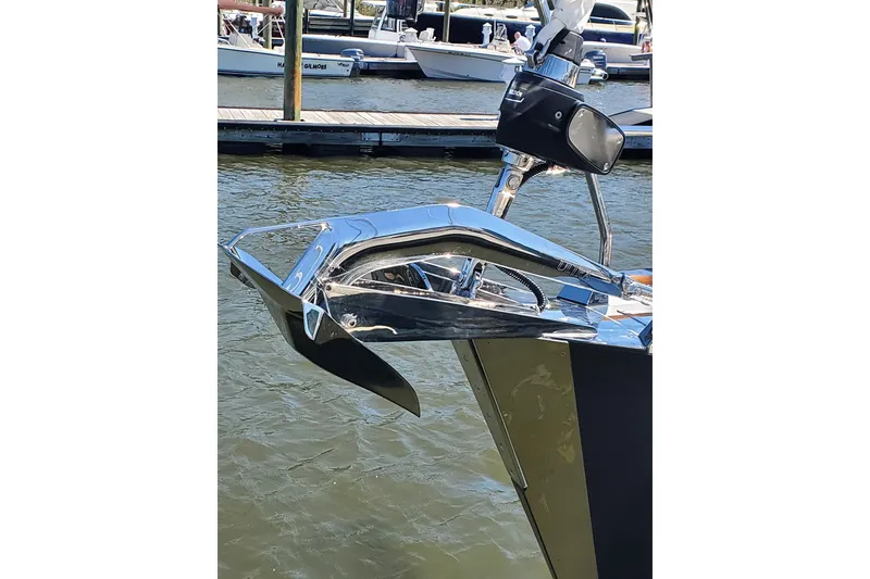 Slide: The Image of 2023 Bluewater 56 yacht sailing on calm waters under a clear blue sky. - 9