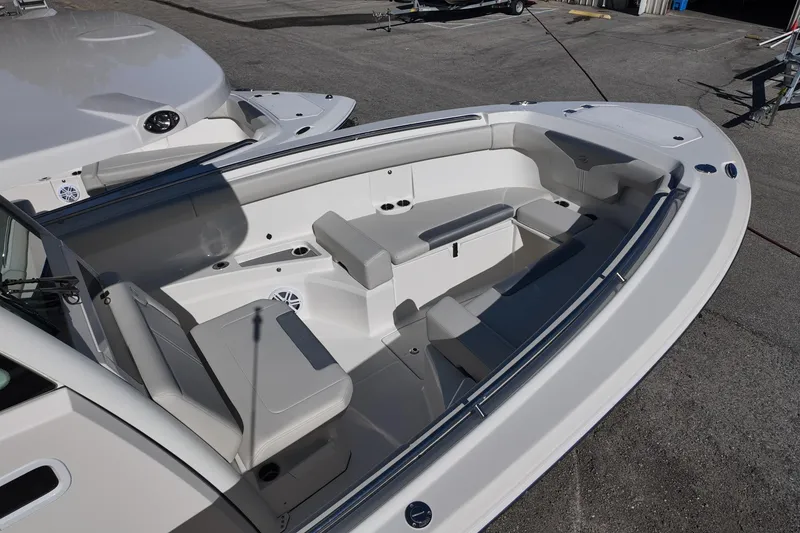 Slide: The Image of 2026 Sailfish 312 CC boat interior with spacious seating and modern design. - 10